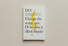 White book cover on beige background, with title DISRUPT and  yellow lightning bolt illustration